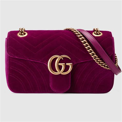 borsa gucci velluto fucsia|Mini borsa effetto gomma con GG in pelle fucsia .